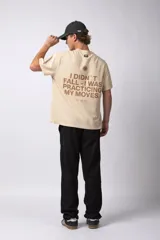 Remera oversize de algodón premium color negro, con estampado frontal minimalista de un sol y la frase "VCP CONCEPT STUDIO" en blanco.