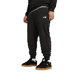 Pantalón de jogging negro Puma ESS con logo blanco estampado en el muslo izquierdo, cintura elástica con cordón ajustable y puños elásticos.