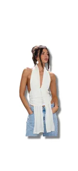 Top blanco con escote halter y espalda descubierta. Se ata al cuello y a la cintura.
