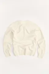 Sudadera lila de algodón con cuello redondo y mangas largas. Estampado en el frente con el logo "Zara A Coruña" y el texto "Est. 1975".
