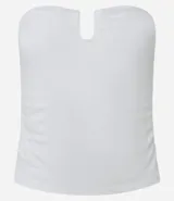 Blusa sin breteles confeccionada en jersey color blanco, con detalle de adorno en forma de U en el busto y fruncidos laterales.