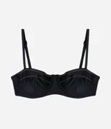Top de bikini negro con breteles finos ajustables y detalle de costura en el borde superior.