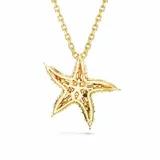 Colgante con cadena dorada y dije de estrella de mar con cristales amarillos y perlas blancas.