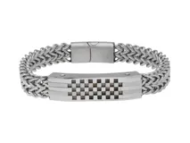 Pulsera de acero con diseño central y cierre de seguridad.