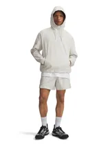Buzo deportivo con capucha Under Armour Unstoppable Woven Hoodie, color blanco hueso, con logo y nombre de la marca estampados en el pecho.