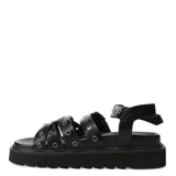 Sandalias de plataforma color negro, con múltiples tiras horizontales con hebillas metálicas y ajuste al tobillo con hebilla.