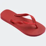 Ojotas Havaianas Top color blanco, con suela de goma y tiras con diseño de espiga.