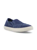 Zapatillas slip-on azules de algodón orgánico con suela de caucho natural.