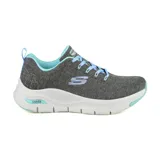 Championes Skechers Arch Fit Comfy Wave, color gris con detalles celestes. Capellada de malla knit, cordones, plantilla Arch Fit removible y media suela con amortiguación.