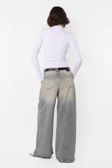Top de morley manga larga gris, al cuerpo; largo camiseta.