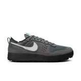 Zapatillas urbanas Nike C1Ty de hombre, color gris con detalles en azul y blanco.