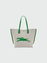 Bolso shopper Longchamp modelo Le Roseau Essential, tamaño L, color crudo con detalles en rojo y logo de jinete bordado.