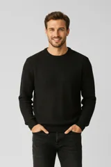 Sweater de algodón negro con cuello redondo y tejido de fantasía.