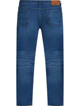 Jeans Bleecker de Tommy Hilfiger, confeccionados en algodón lavado para mayor comodidad y con elasticidad para un ajuste flexible. Diseño de 5 bolsillos, cierre con botón y cremallera, detalles distintivos de Tommy Hilfiger y logo de Tommy Hilfiger bordado.