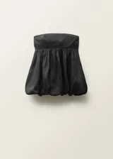 Top palabra de honor negro, con bajo abullonado y cierre de cremallera en la parte posterior.