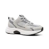 Championes deportivos American Sport Joggy color beige con detalles en dorado y suela gruesa.