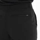 Pantalón de mujer color negro, de corte recto y tiro medio. Confeccionado en tejido elástico que combina algodón, nylon y spandex. Cuenta con bolsillos laterales y ajuste en los tobillos.