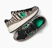 Championes Converse Wave Trainer OX con estampado animal print de leopardo y cebra, con logo de la marca en color verde.