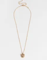 Cadena dorada con dije de oso cubierto de strass.