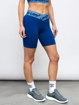 Calza corta de lycra azul con cintura alta con elástico con logo de la marca.