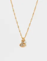 Cadena dorada con dije de strass y corazón de metal.