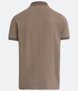 Polo de manga corta color beige, confeccionada en algodón con cuello jacquard y ribete en las mangas.