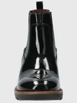 Botín Chelsea de cuero color marrón, con elásticos laterales, suela de goma y taco de 5 cm.