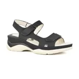 Sandalias negras con plataforma blanca y ajuste con velcro.