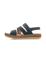 Sandalia azul con múltiples tiras con velcro, plantilla acolchada y suela cosida y ultraflexible.