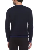 Sweater de punto azul marino con diseño jacquard bitono, cuello redondo y logo bordado de Original Penguin.