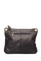 Morral bandolera de cuero negro con dos bolsillos frontales de cuero con estampado animal print de vaca.
