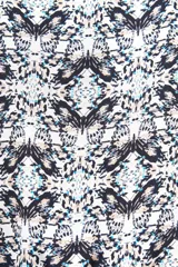 Camisa estampada con mangas abullonadas y ajuste con lazos en la cintura.