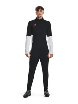 Pantalón deportivo Under Armour Challenger de hombre, color gris con detalles en naranja y logo de la marca en blanco.
