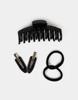 Set de accesorios para el pelo color negro, incluye: cuatro gomitas de toalla, dos hebillas pico de pato y un broche XL tipo pinza.