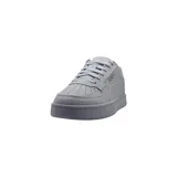 Zapatillas Puma Caven 2.0 grises de estilo urbano.