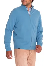 Sweater celeste de punto con cuello alto y cierre frontal completo.