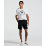 Remera blanca de algodón con logo de Original Penguin estampado en el pecho.