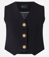 Chaleco negro de crepé con escote en V y abotonadura dorada. Corte slim y sin mangas.