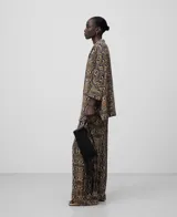 Pantalón de viscosa con estampado de piel de serpiente en tonos marrones y negros. Corte recto y cintura elástica.