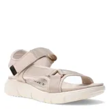 Sandalias estilo teva color nude, con plataforma y tiras ajustables.