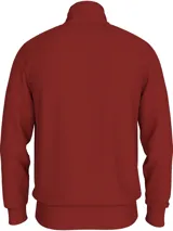 Buzo rojo con cuello alto, cierre de cremallera, dos bolsillos delanteros tipo canguro y logo de Tommy Hilfiger bordado en el pecho.