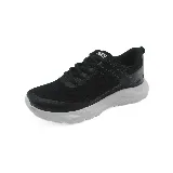 Zapatillas deportivas Maximum negras con suela gris.