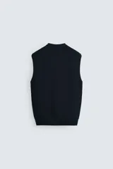 Chaleco de punto azul marino con cuello en V y diseño acanalado.