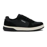 Zapatillas urbanas de hombre marca Country, color negro con detalles en gamuza y suela de goma color crema.