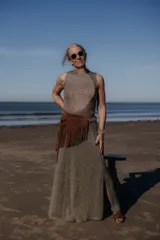 Pollera larga de viscosa con lurex color azul petróleo, con tajo lateral.