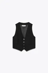 Chaleco negro de vestir con escote en pico, sin mangas y cierre frontal con botones.