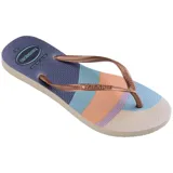 Ojotas Havaianas Slim Palette Glow con base estampada en tonos beige, rosa y marrón, y tiras finas color cobre.