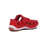 Zapato guillermina casual color coral, con calado y ajuste con velcro.