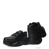 Championes blancos con plataforma alta y suela con diseño irregular.