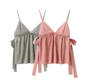 Blusa con breteles finos, escote en V con volados y lazos laterales.